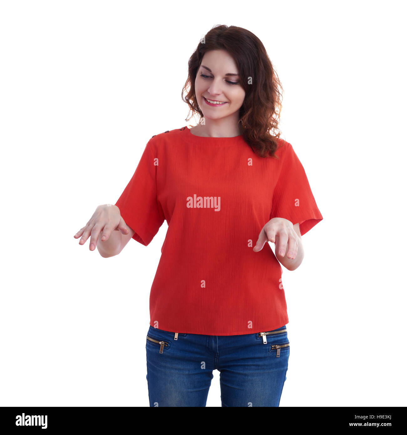 Smiling young woman over white isolated background Stock Photo - Alamy
