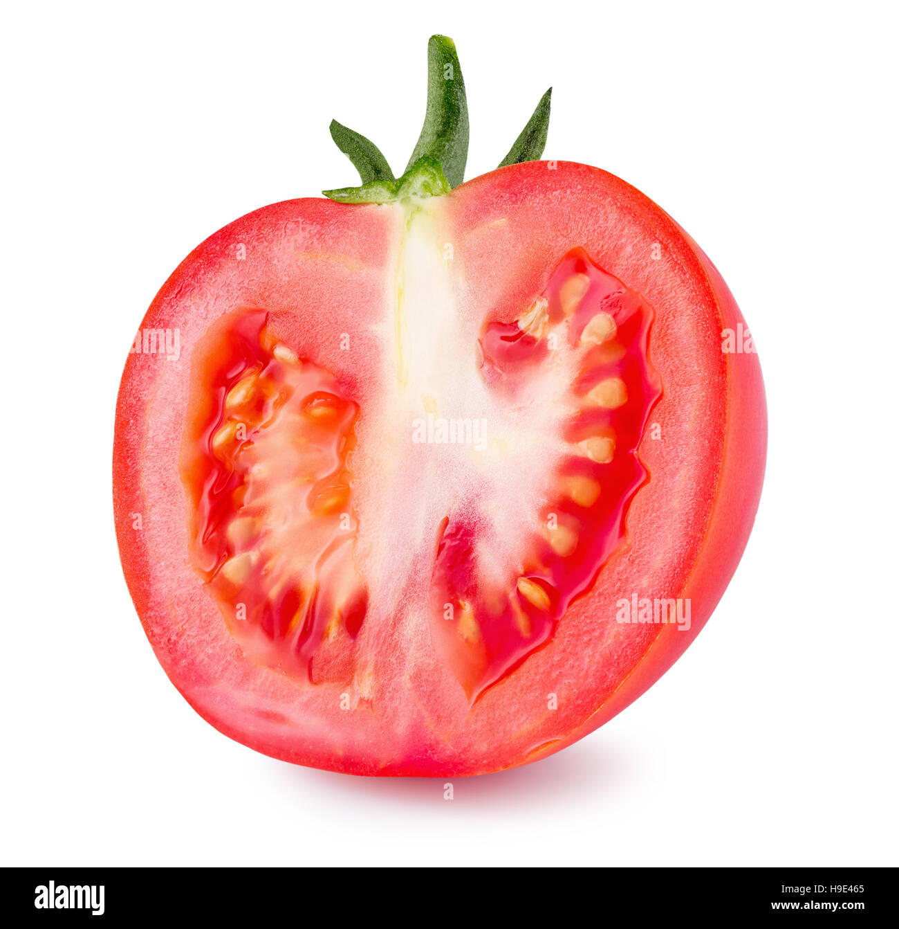 half of tomato isolated on the white background Stock Photo - Alamy