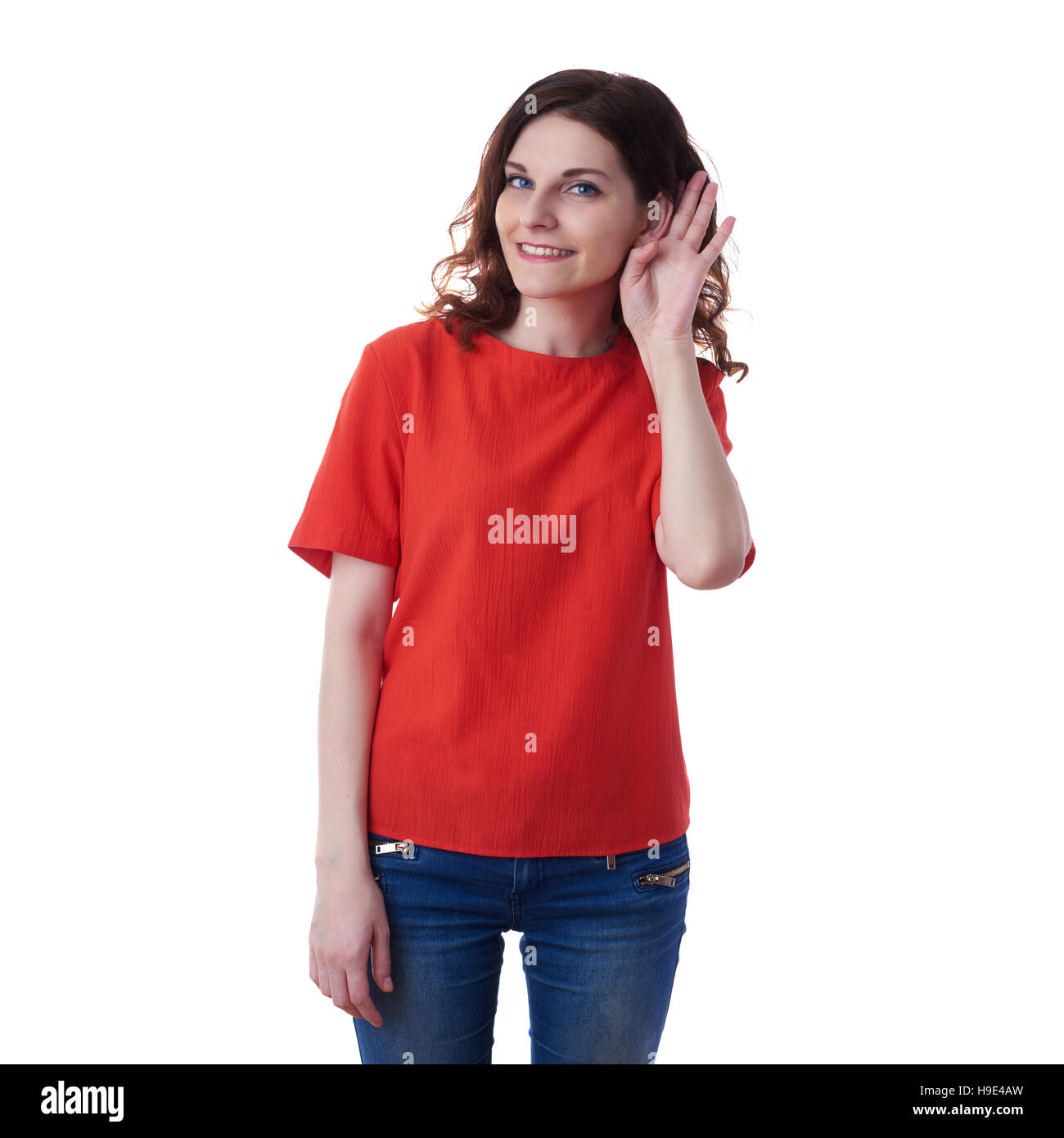 Smiling young woman over white isolated background Stock Photo - Alamy