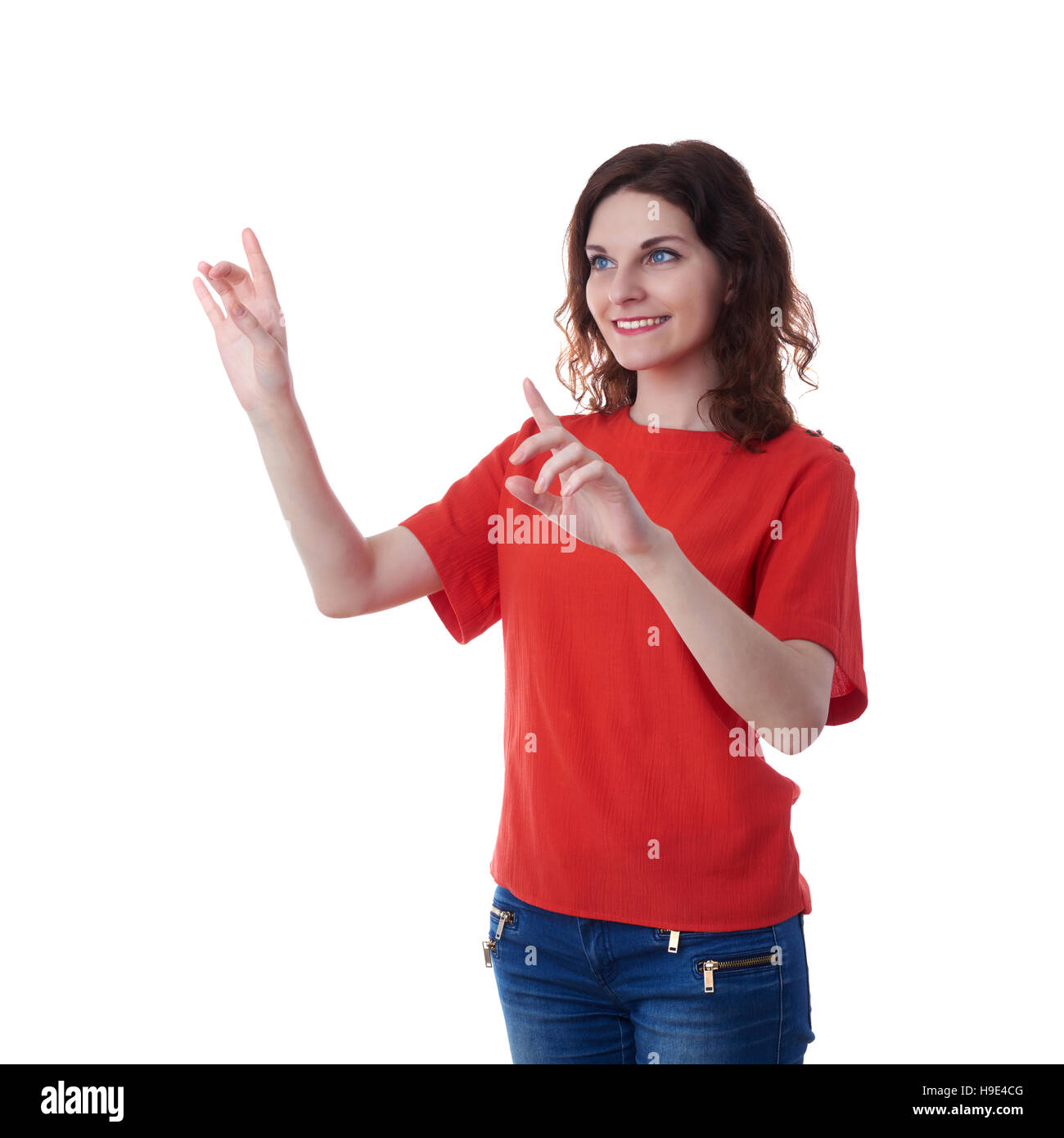 Smiling young woman over white isolated background Stock Photo - Alamy