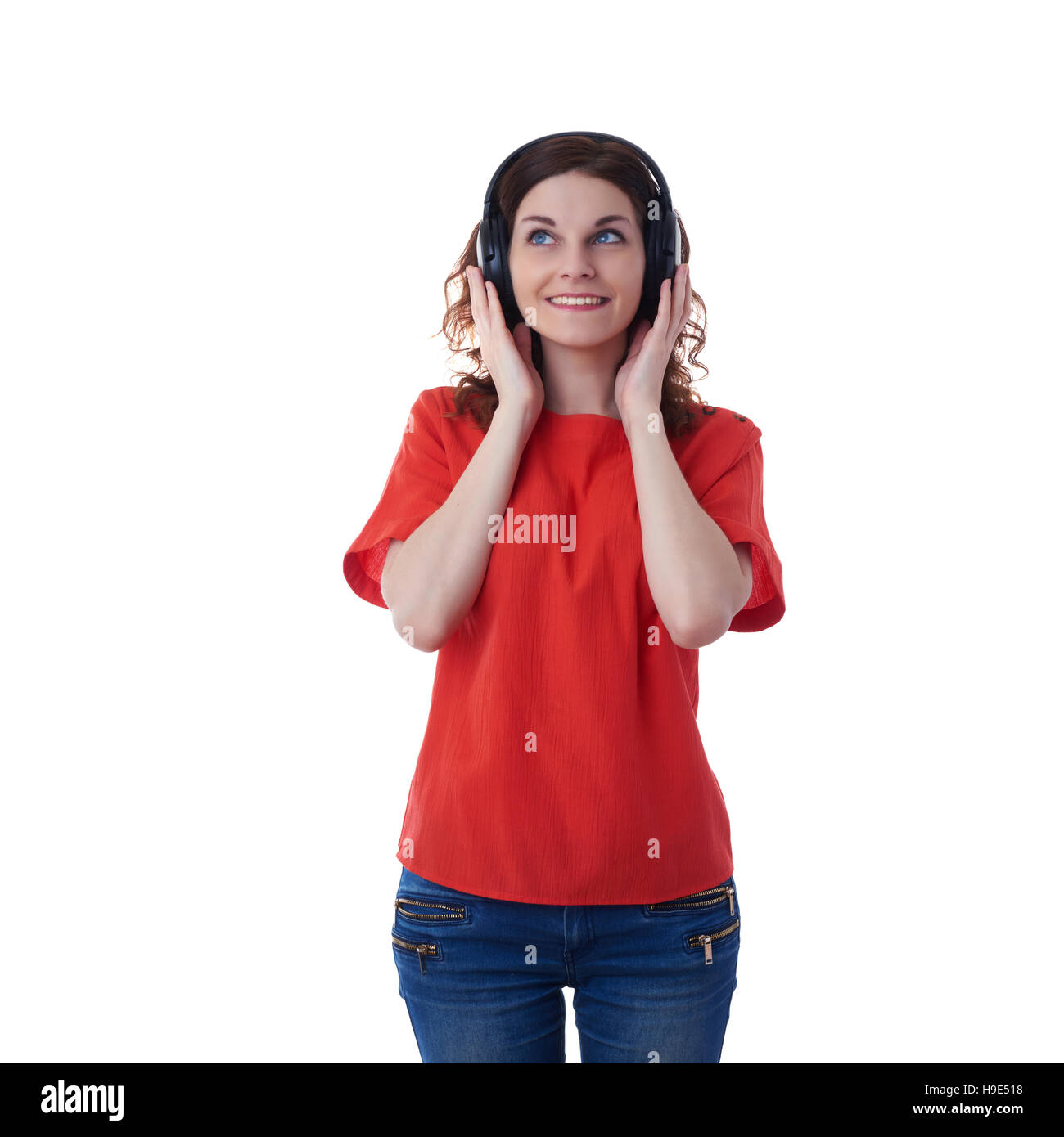 Smiling young woman over white isolated background Stock Photo - Alamy