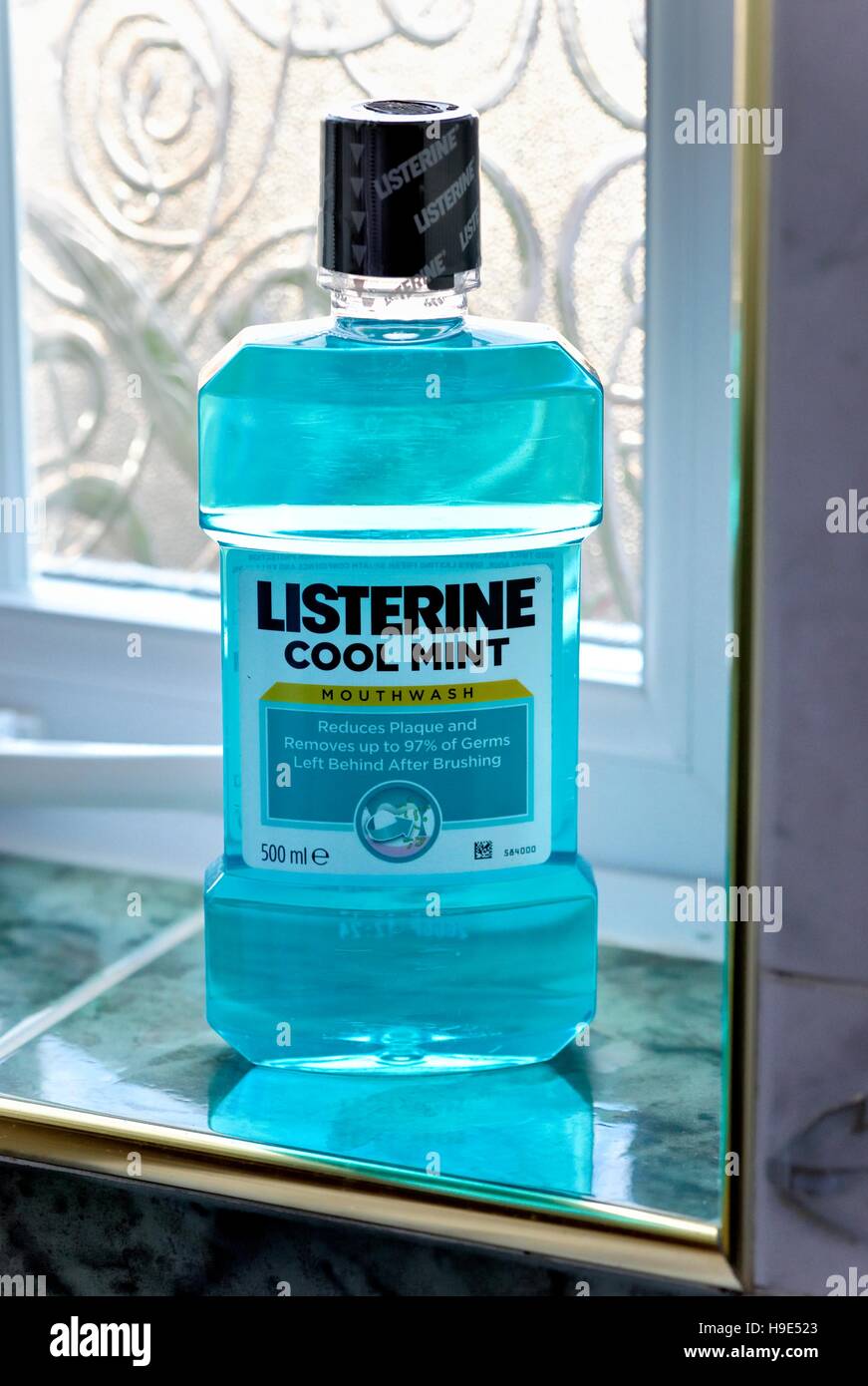 Listerine cool mint mouthwash on a bathroom  window. Stock Photo