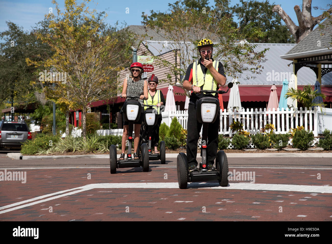 Mount Dora Florida USA Tourists riding around town on Segway scooters