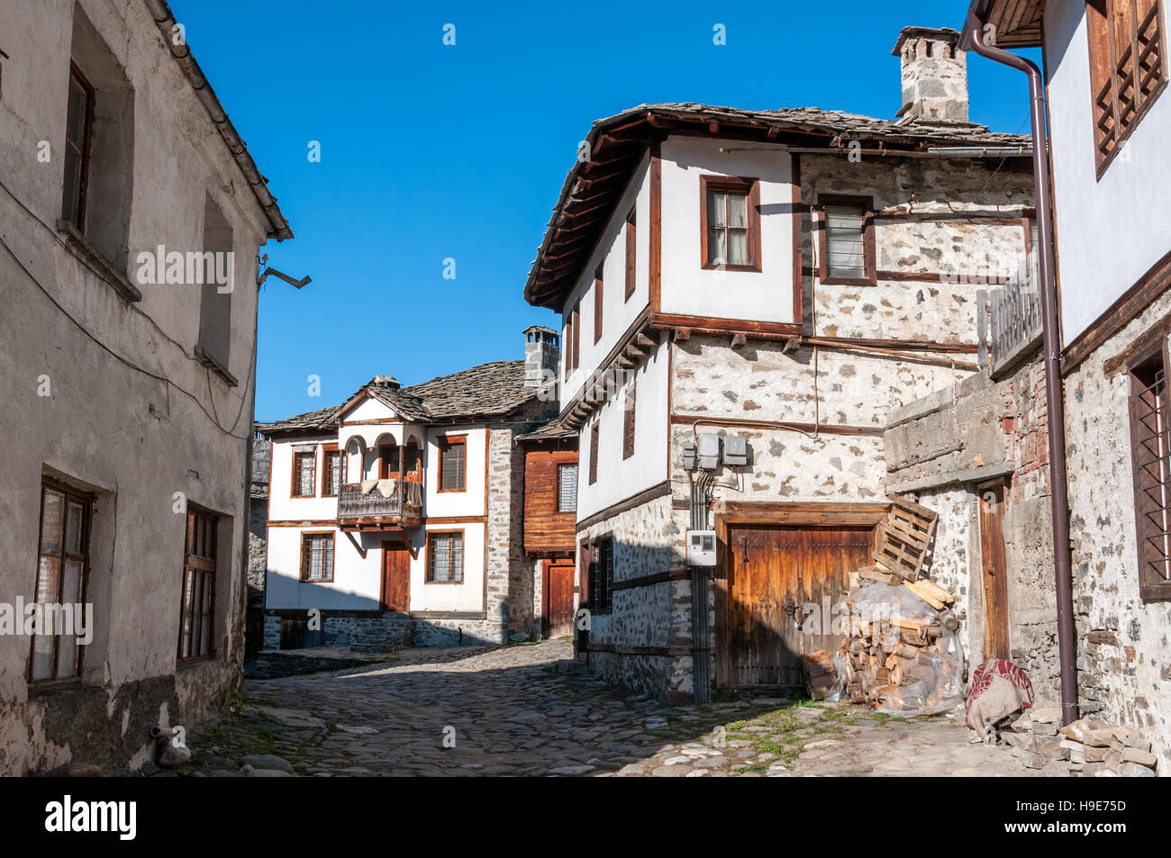 Old traditional rustic houses in ethnographic reserve of Shiroka Laka, Bulgaria Stock Photo