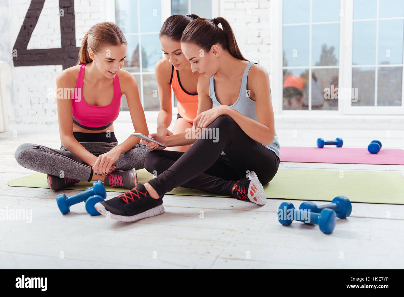 Joyful group three young women hi-res stock photography and images - Alamy