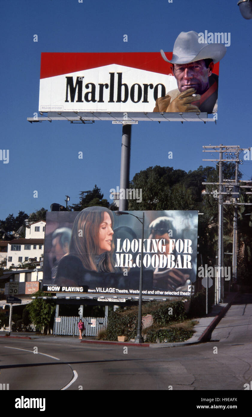 Billboards on the Sunset Strip in Los Angeles promoting Marlboro Cigarettes and the movie Looking For Mr. Goodbar in 1977 Stock Photo