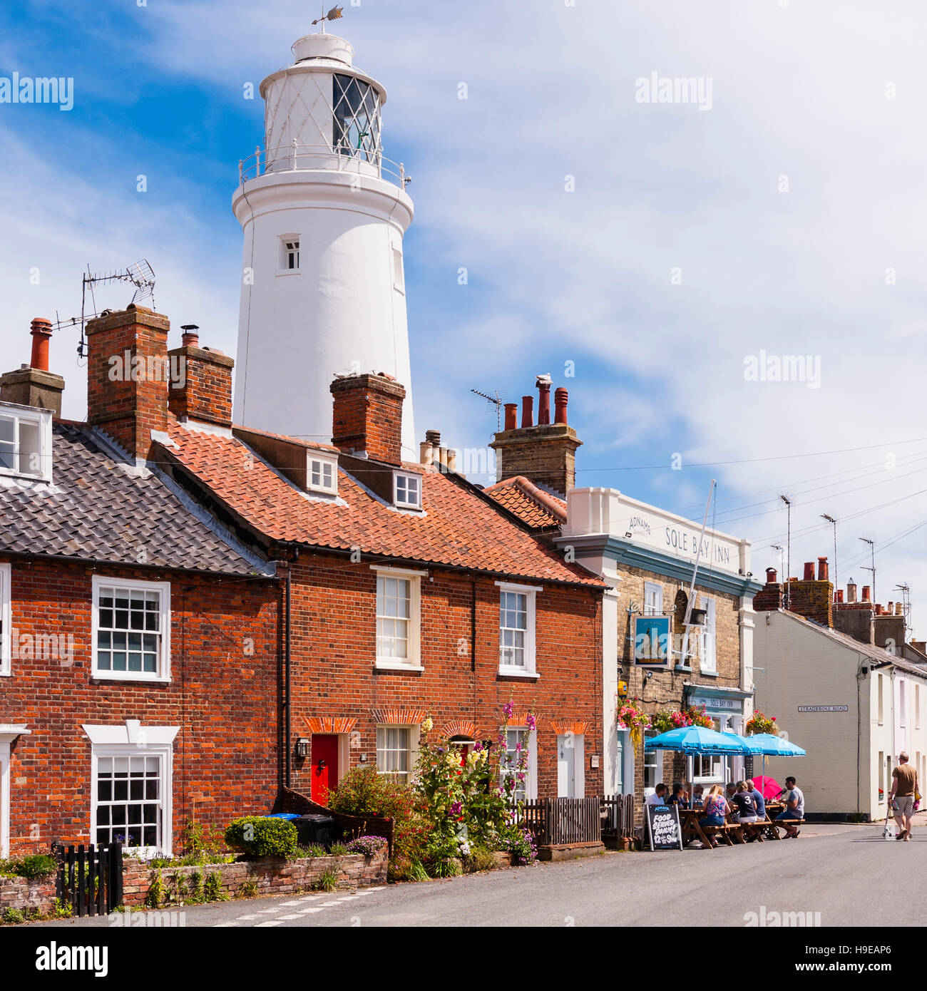 The Sole Bay Inn pub and lighthouse in Southwold , Suffolk , England , Britain , Uk Stock Photo