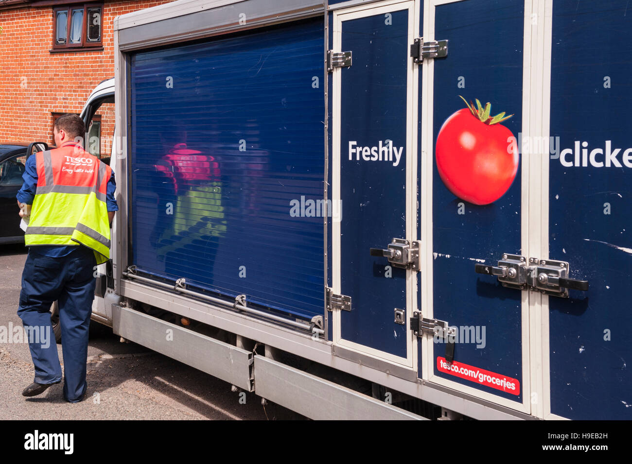 A Tesco delivery van delivering groceries in the Uk Stock Photo
