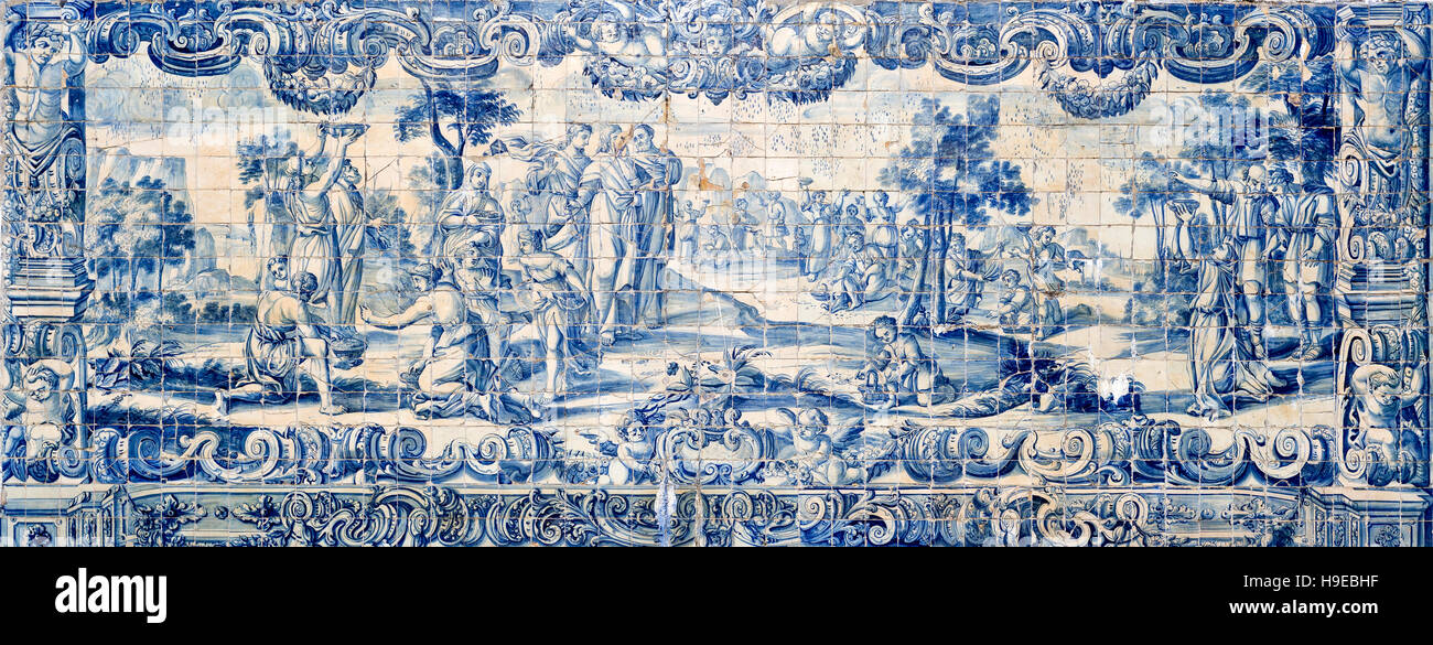 18th century tiles panel depicting the role of water in society located in between the arches at the end of the Aqueduct of the Free Waters before the Stock Photo
