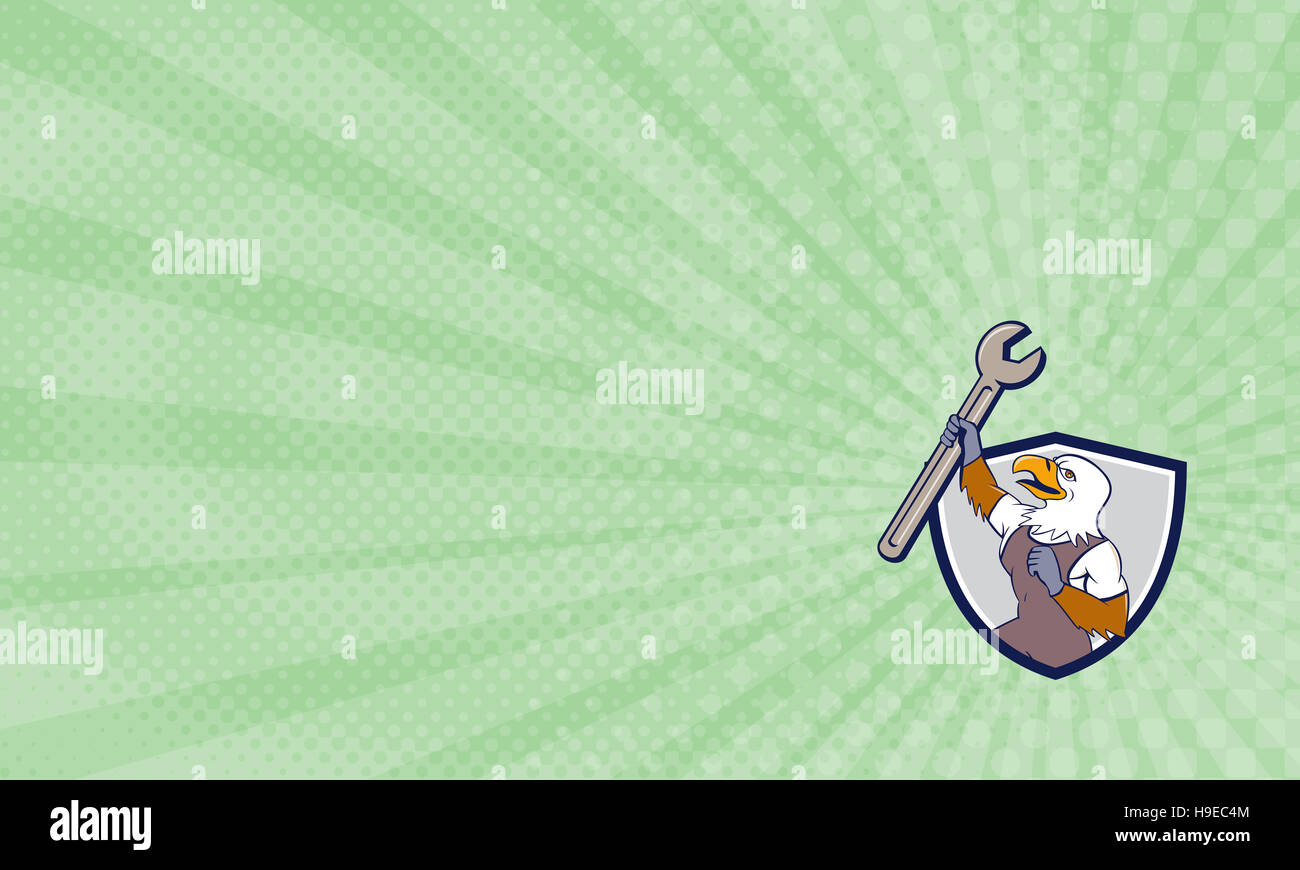 Business card showing Illustration of a mechanic american bald eagle holding spanner looking to the side set inside shield crest done in cartoon style Stock Photo