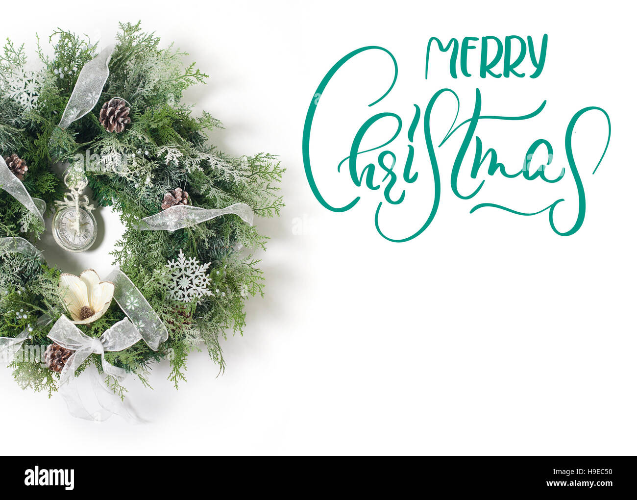 Christmas wreath on white background. Calligraphy lettering Stock Photo