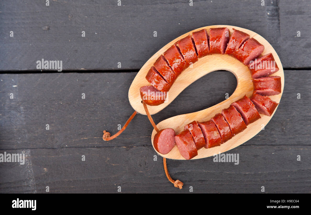 Traditional Dutch smoked sausage called Rookworst on wooden background Stock Photo Alamy