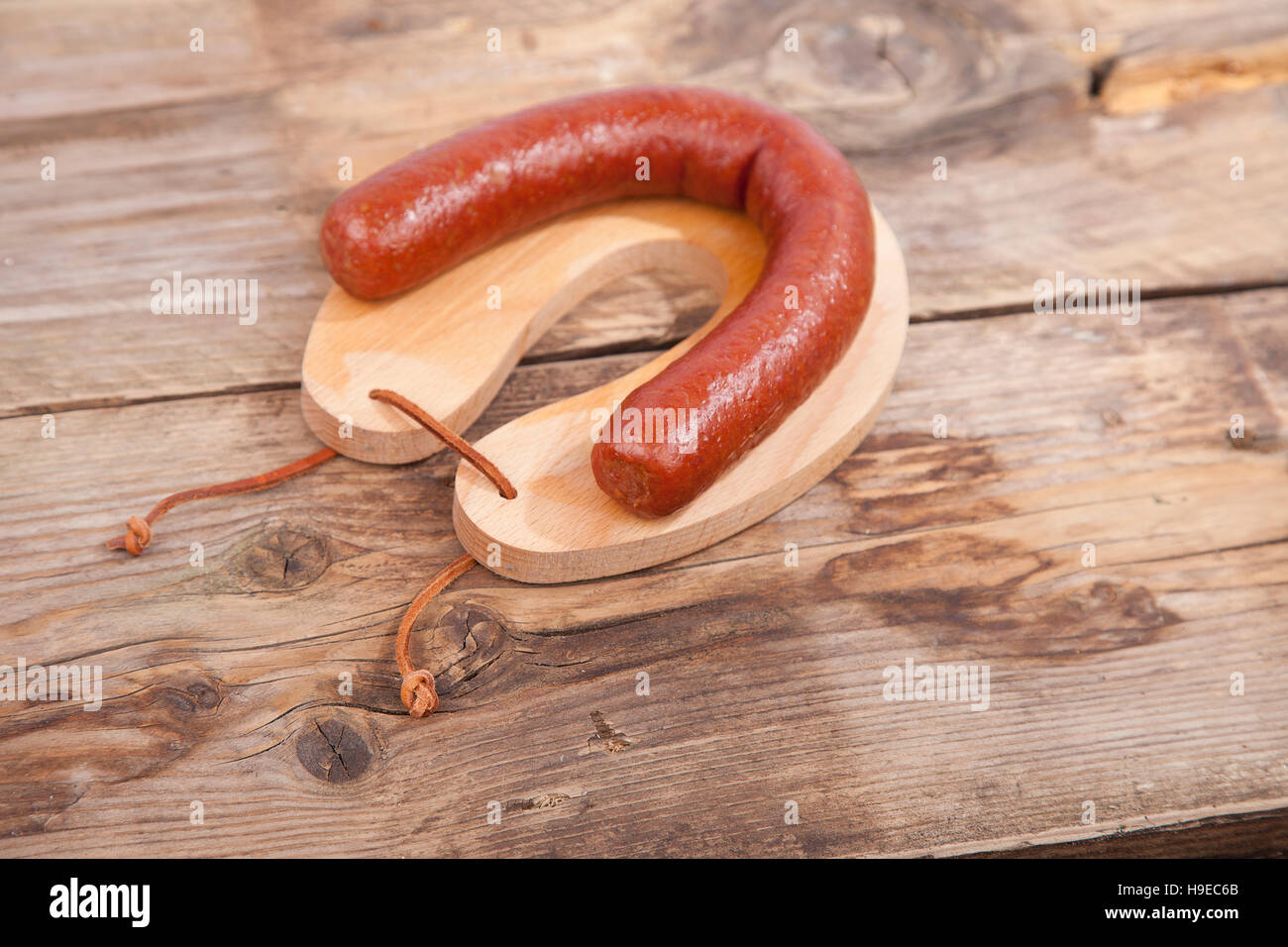 Traditional Dutch smoked sausage called Rookworst on wooden background Stock Photo Alamy