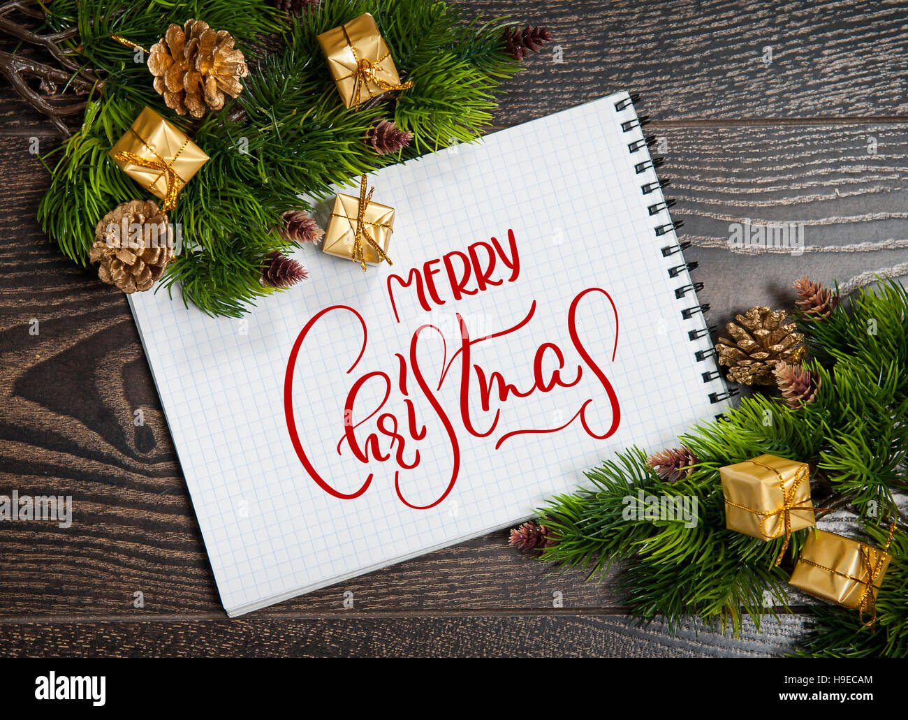 Holiday blank note with text Merry Christmas. Calligraphy and lettering Stock Photo