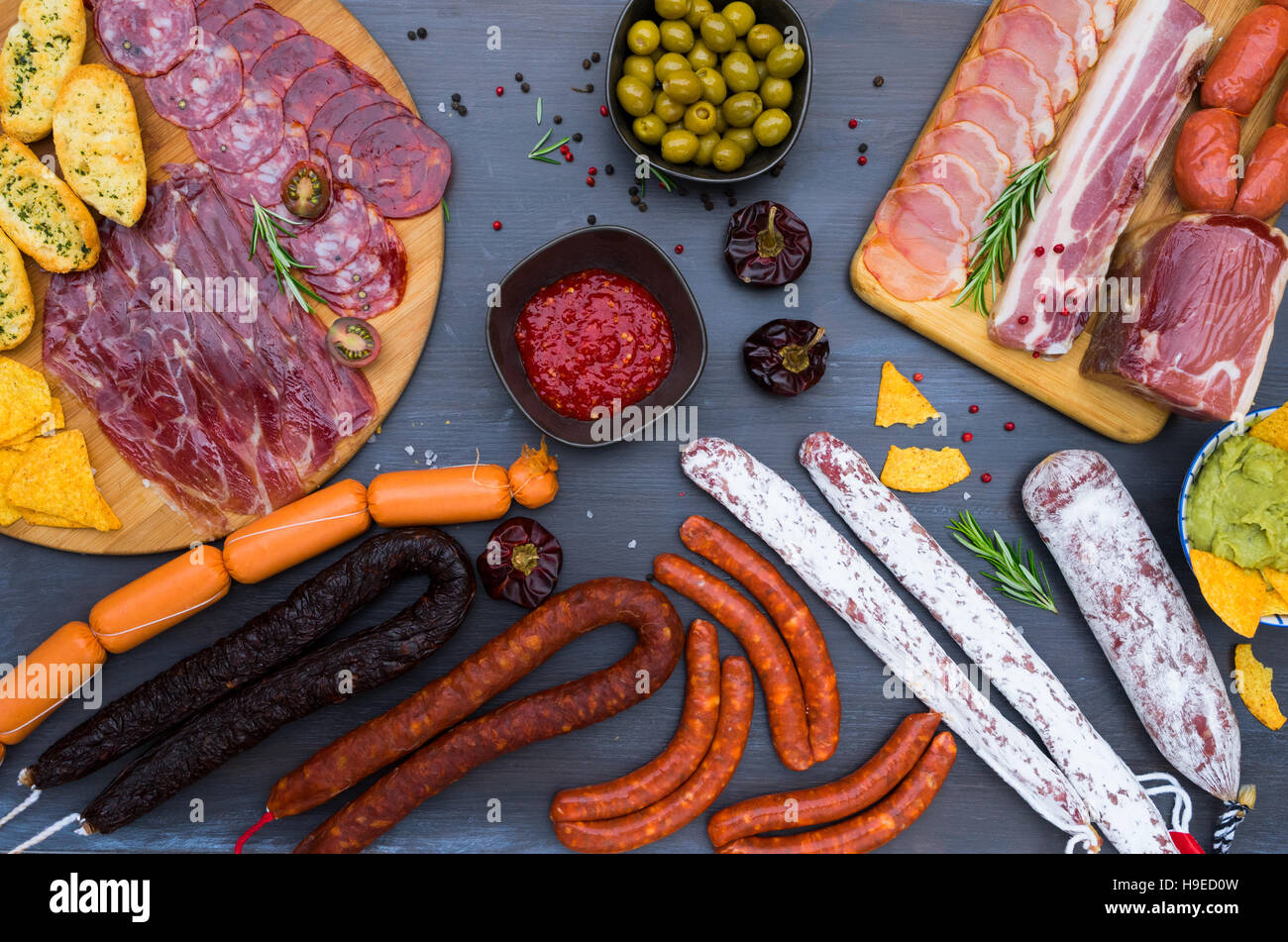 Picnic table with spanish sausage tapas Stock Photo Alamy