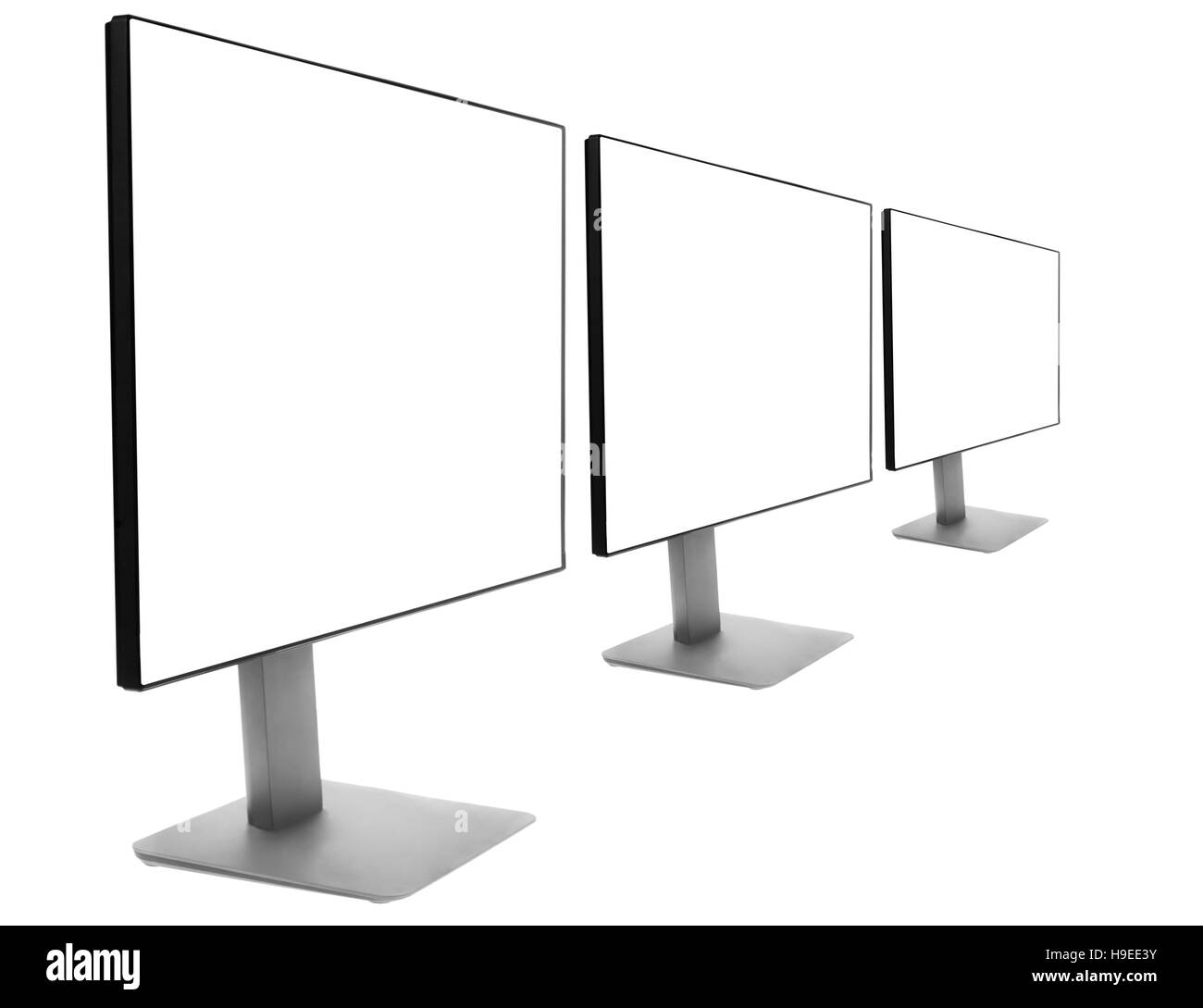 Three monitors in a row Stock Photo