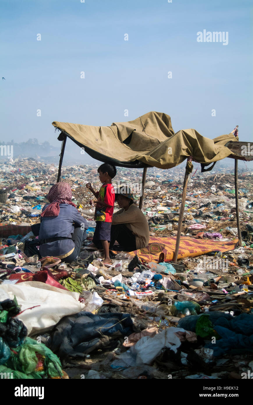 A family make a make shift camp at the former Stung Meanchey garbage dump (nicknamed Smokey