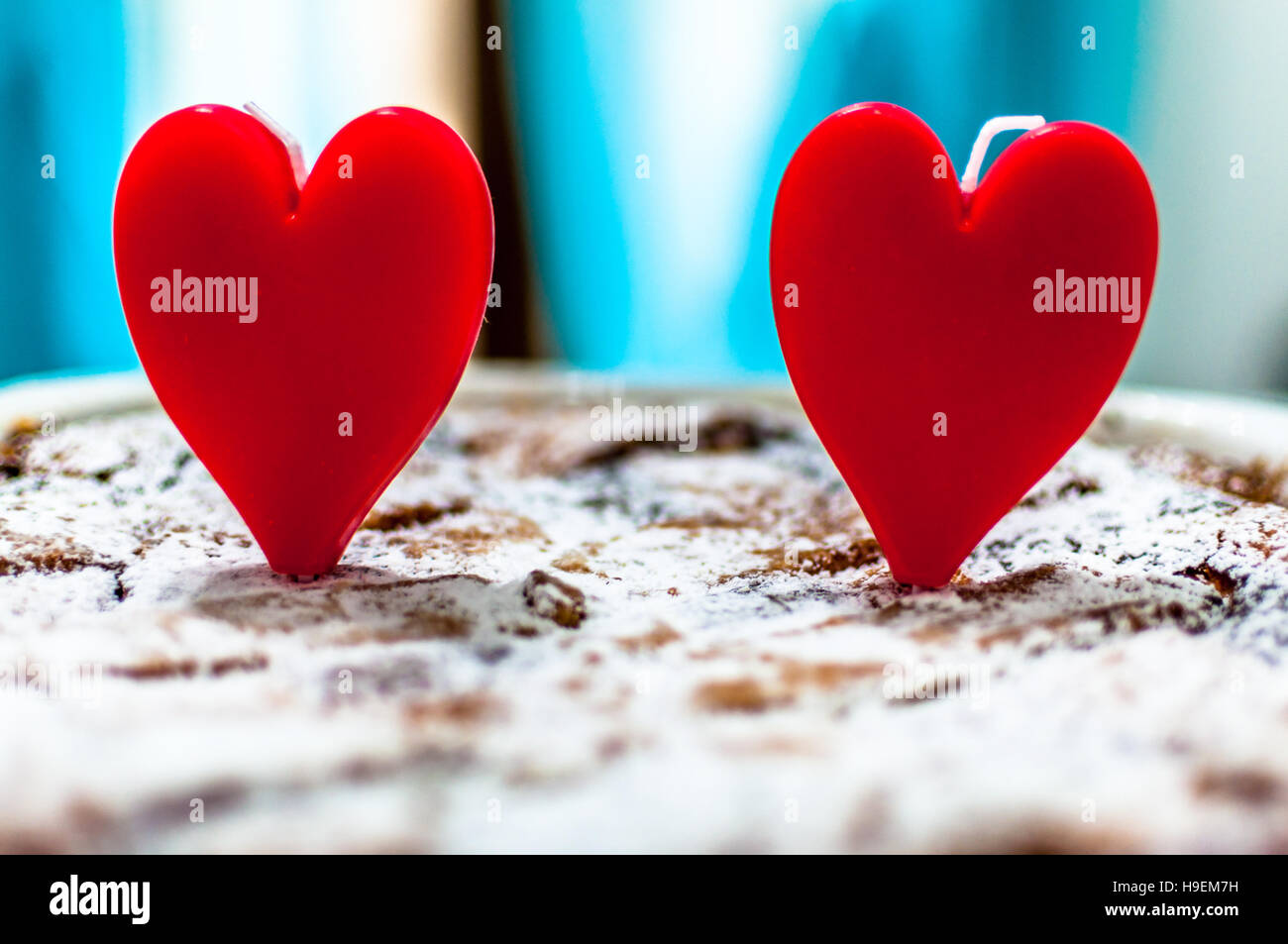 Heart shape cake candles on a cake Stock Photo - Alamy