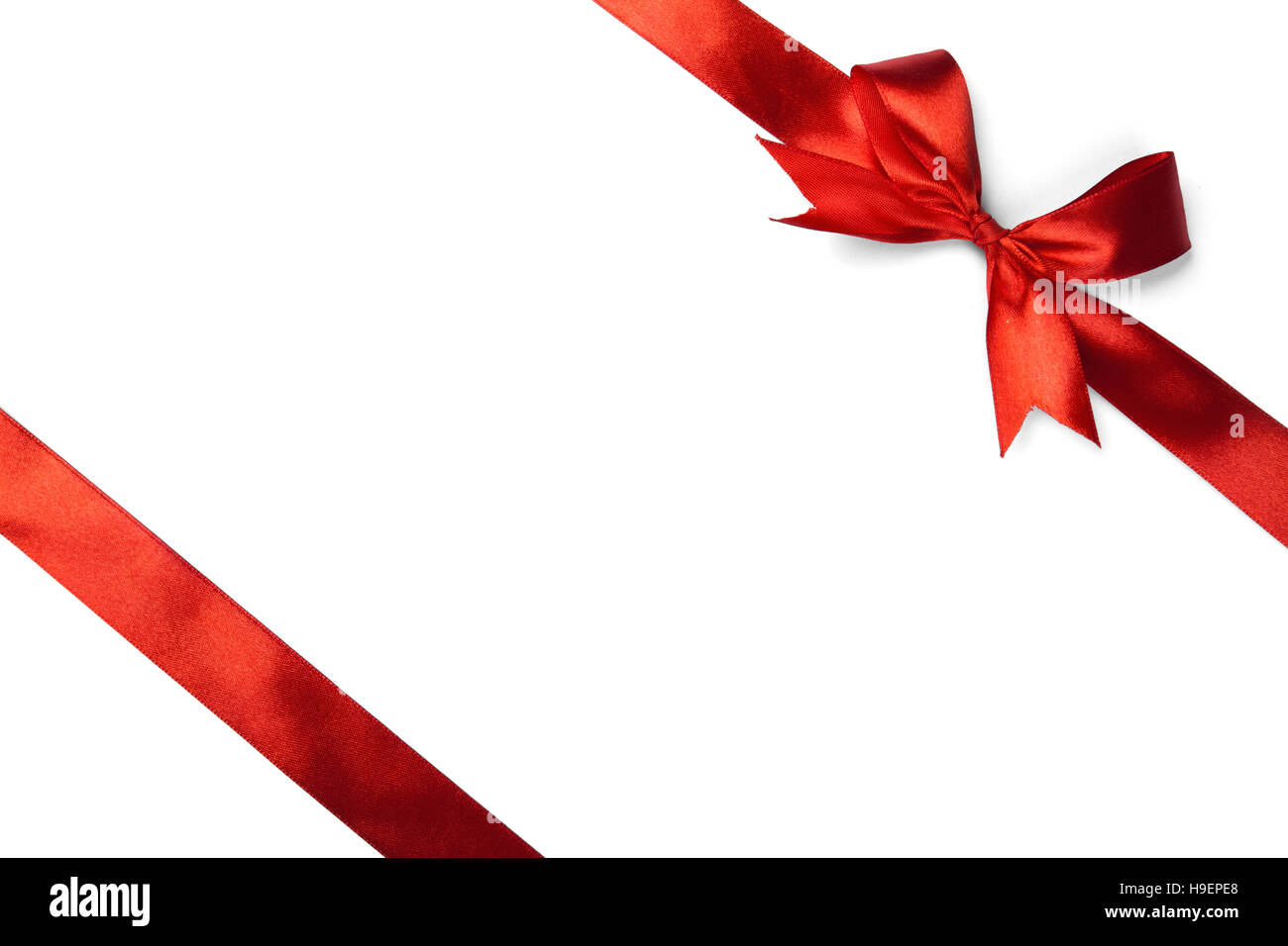 Red ribbon bow isolated on white background Stock Photo - Alamy