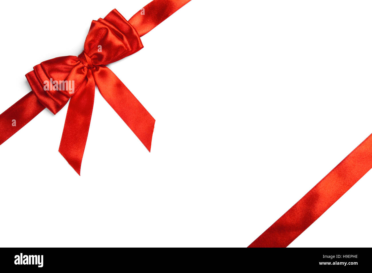 Red ribbon bow isolated on white background Stock Photo - Alamy