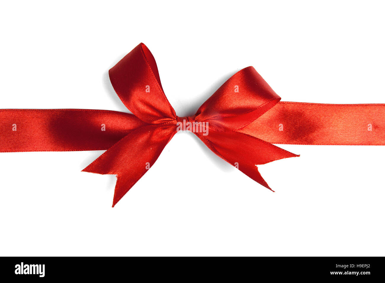 Red ribbon bow isolated on white background Stock Photo - Alamy