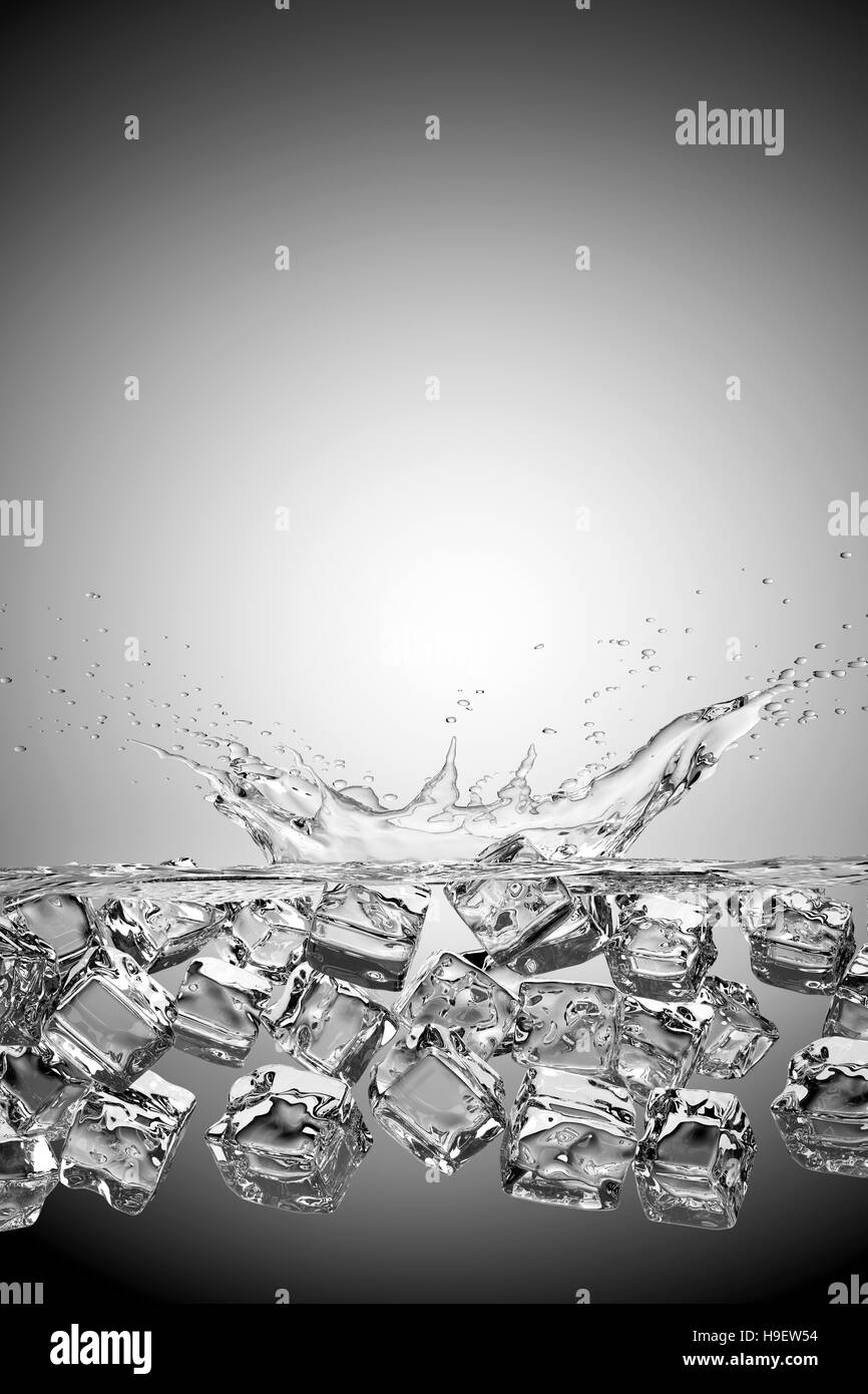 Ice cubes splashing into water and floating Stock Photo Alamy
