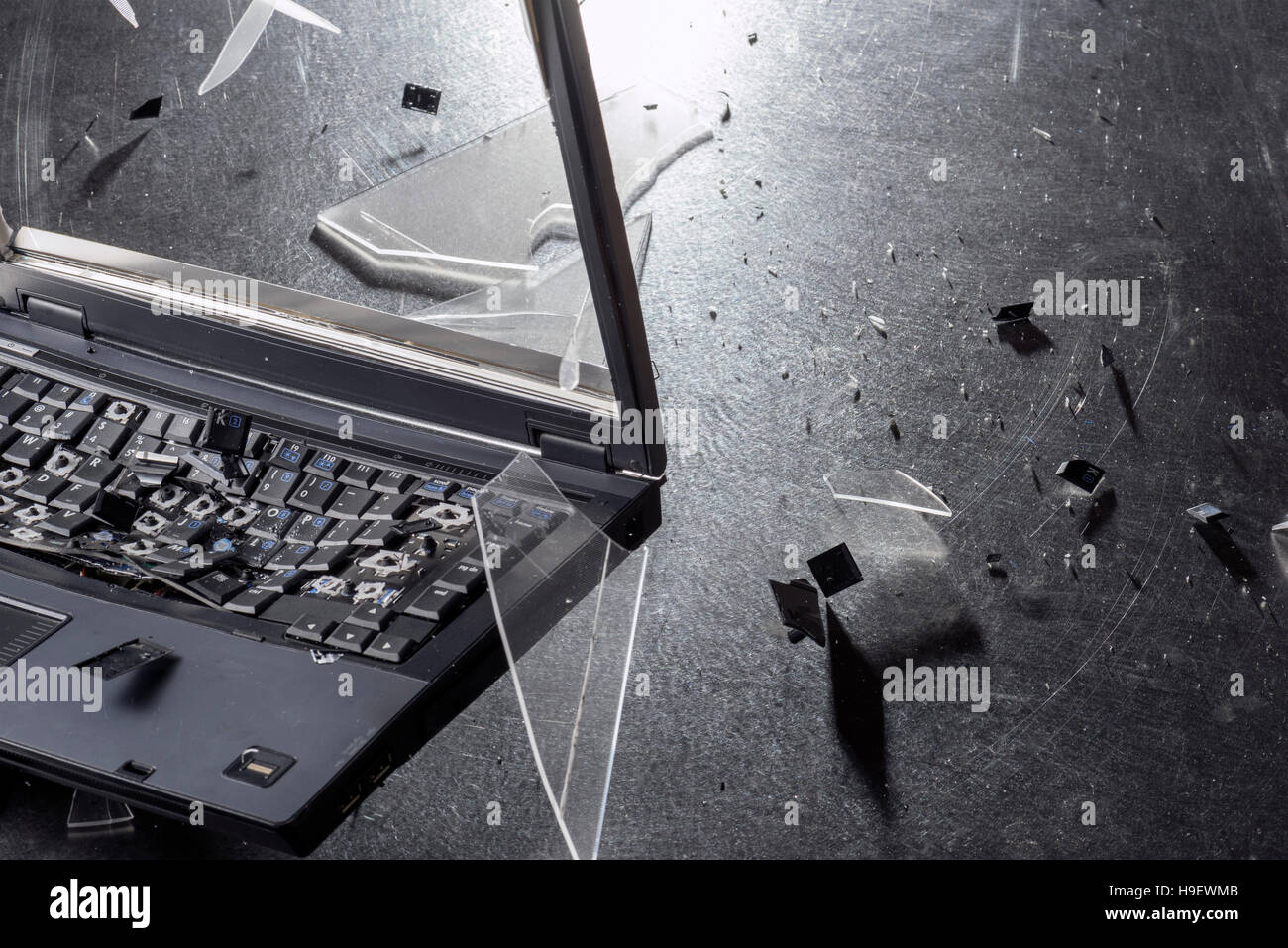Shards from shattering laptop Stock Photo