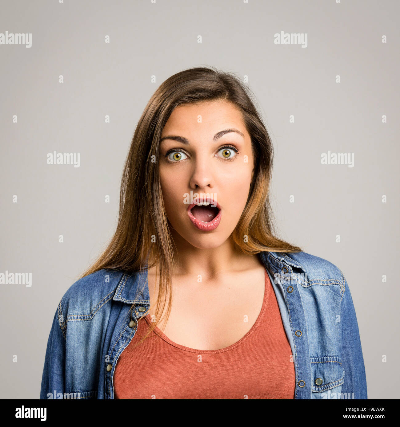 Portrait of a beautiful woman with a surprised face Stock Photo