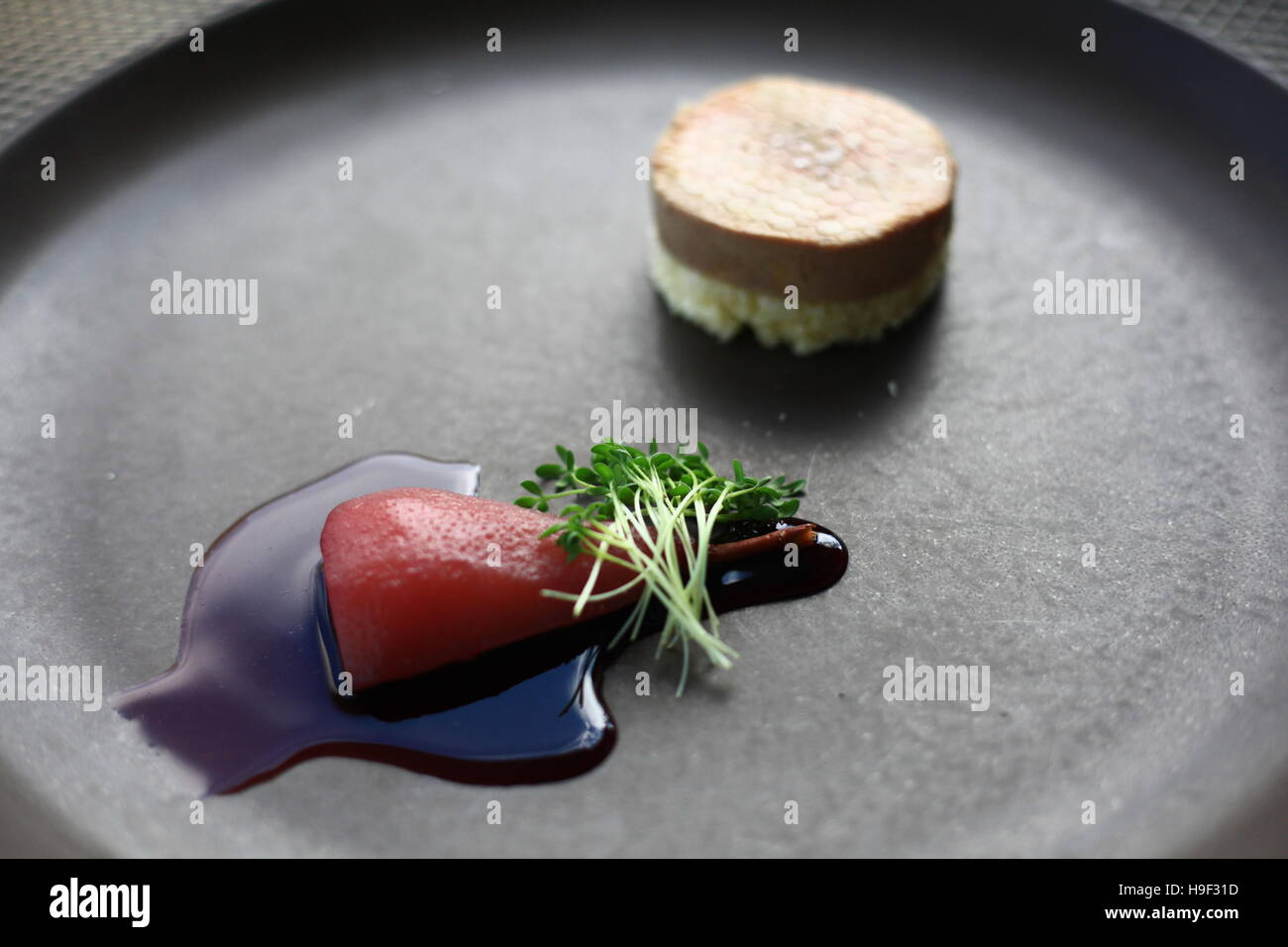 Foie Gras Torchon With Brioche Bread Poached Pear And Red Wine Sauce Stock Photo Alamy