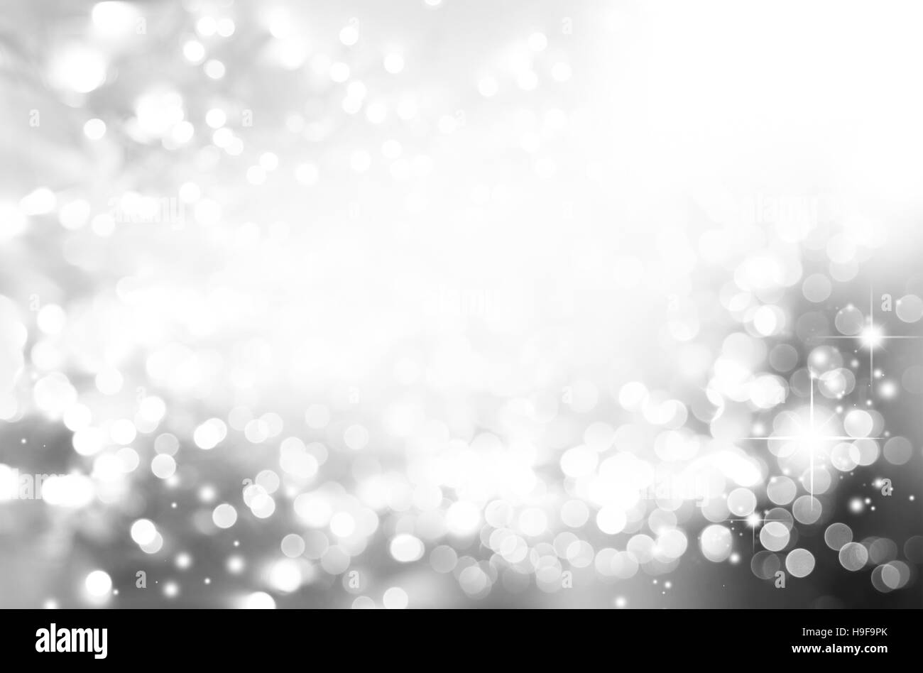 Abstract bokeh circles and stars Christmas background Stock Photo