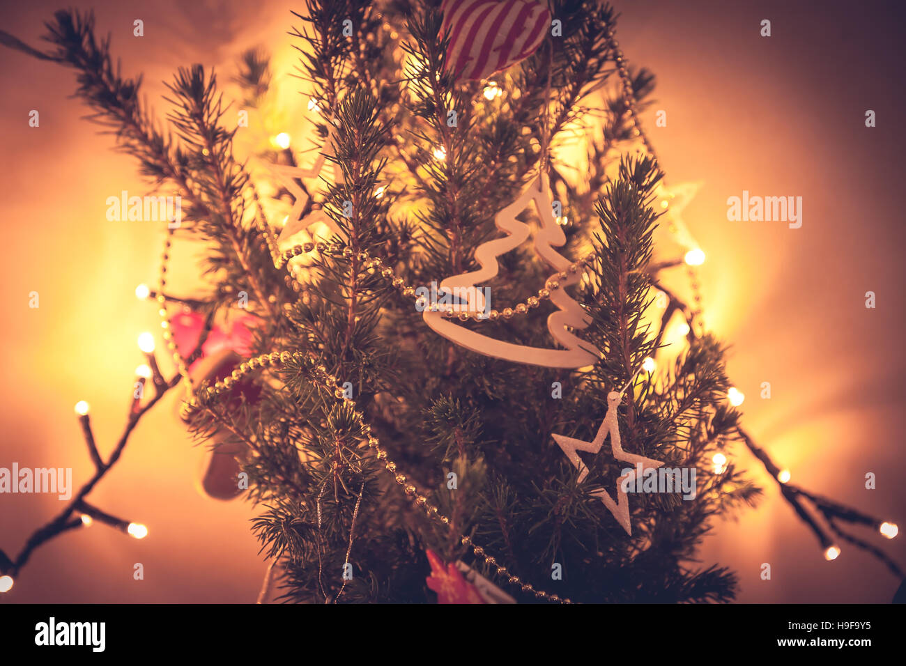 Unusual decorated Christmas tree in orange colors Stock Photo Alamy
