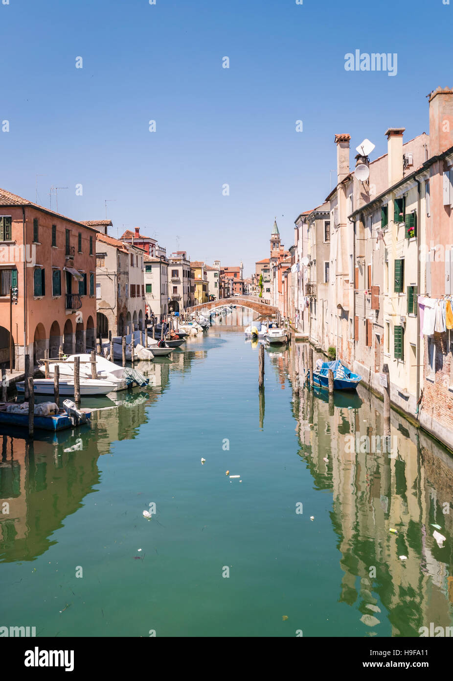 Characteristic canal in Chioggia, lagoon of Venice, Italy. Stock Photo