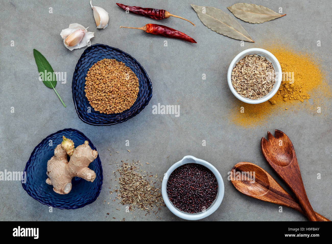 Assorted of spices ginger,fennel seed,dried thyme ,sage leaves,g Stock Photo