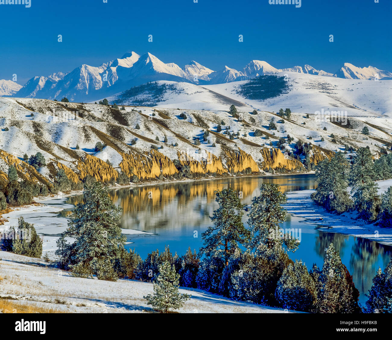 flathead river and the mission mountains in winter near ronan, montana