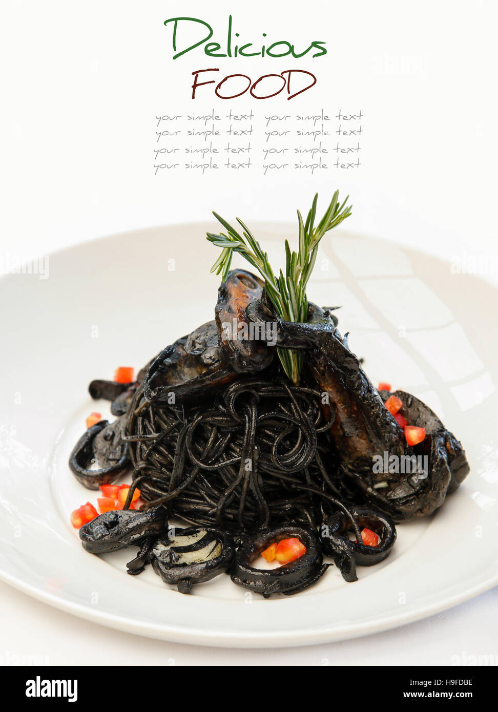 Italian cuisine squid ink spaghetti and seafood Stock Photo - Alamy