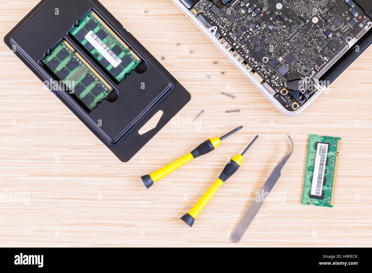 Technician support upgrade part and fixing laptop Stock Photo Alamy