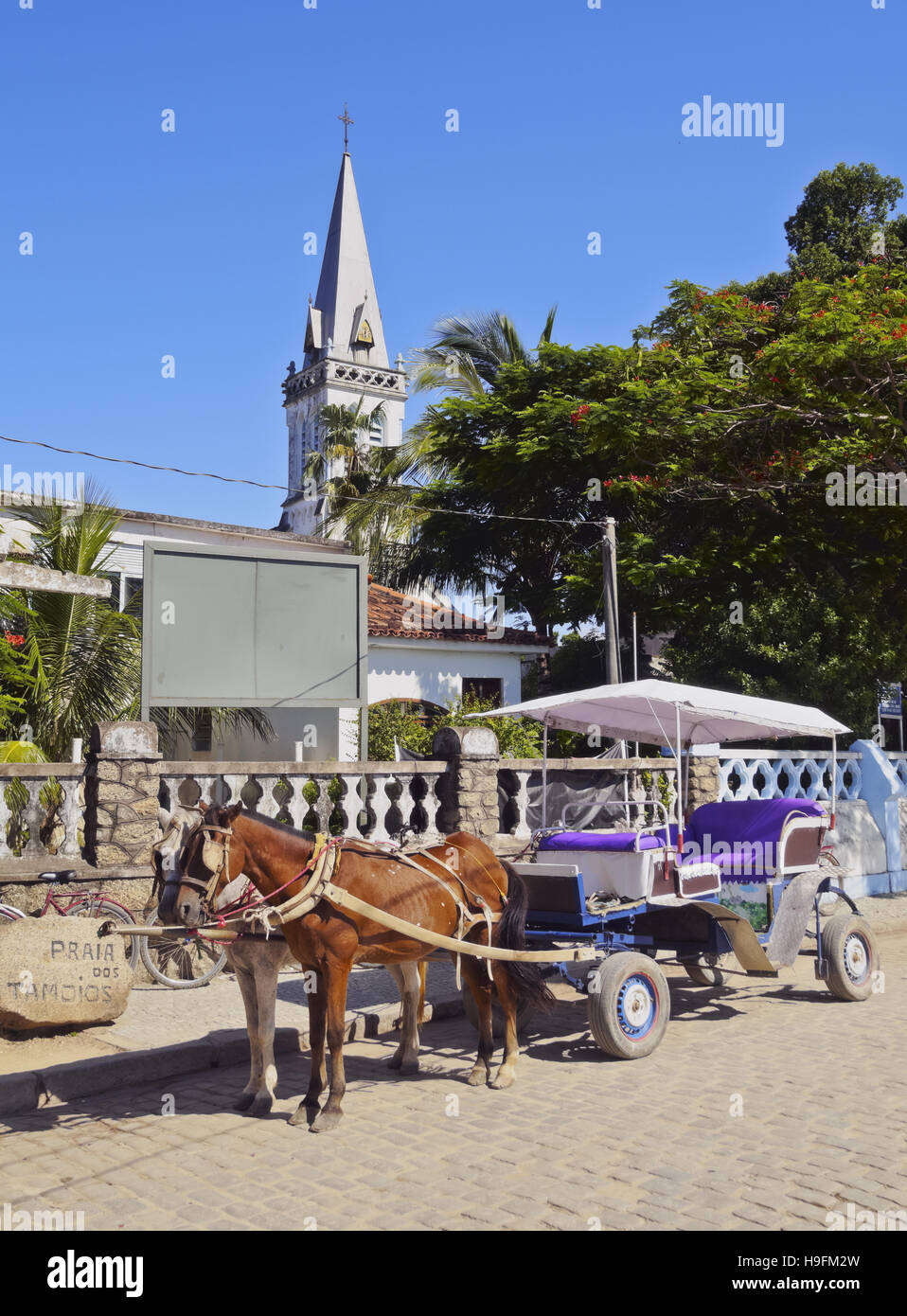 Brazil, State of Rio de Janeiro, Guanabara Bay, Paqueta Island, Horse carriage in front of the Bom Jesus do Monte Church. Stock Photo