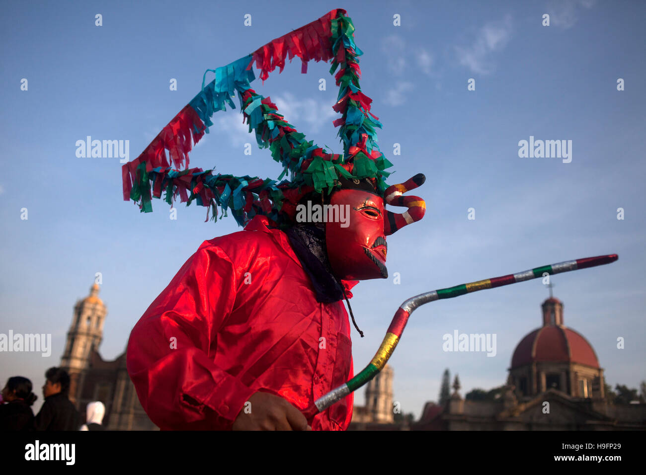 Dancers from El Palmar, Puebla, perform Saint James' dance during the annual pilgrimage to the Basilica of Our Lady of Guadalupe Stock Photo