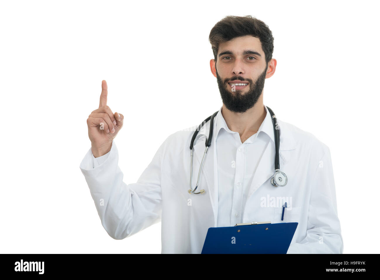 Male doctor makes a pointing finger gesture, isolated over a white ...