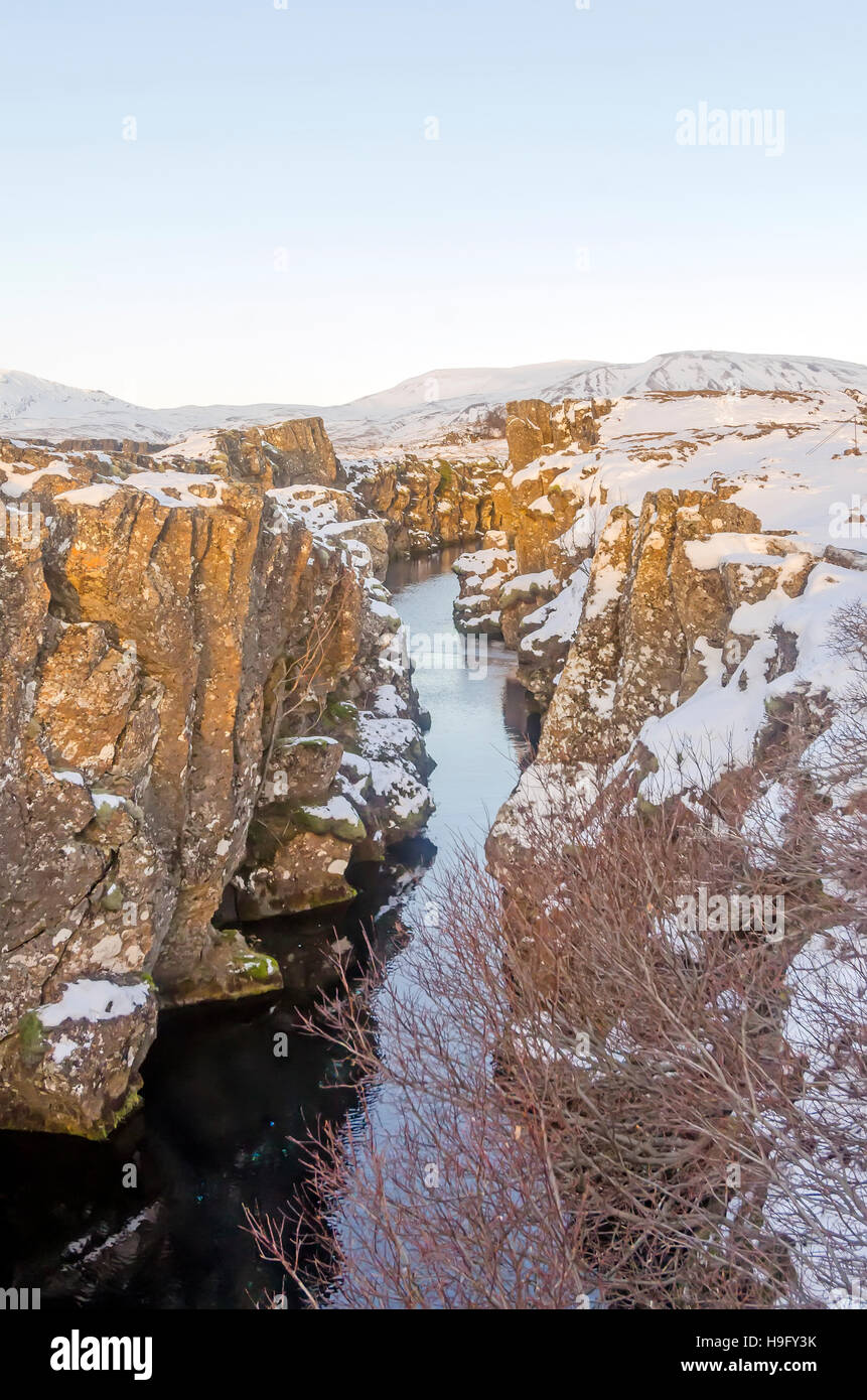 Fault crack in the Earth's crust where Eurasian and North American tectonic plates meet, Thingvellir National Park Iceland Stock Photo