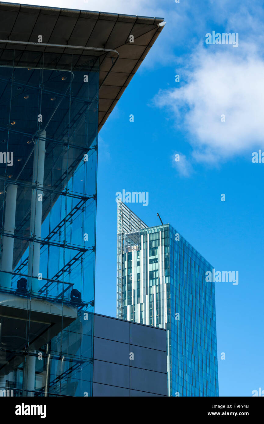The Beetham Tower and the glass of the atrium of the Bridgewater Hall, Manchester, England, UK Stock Photo