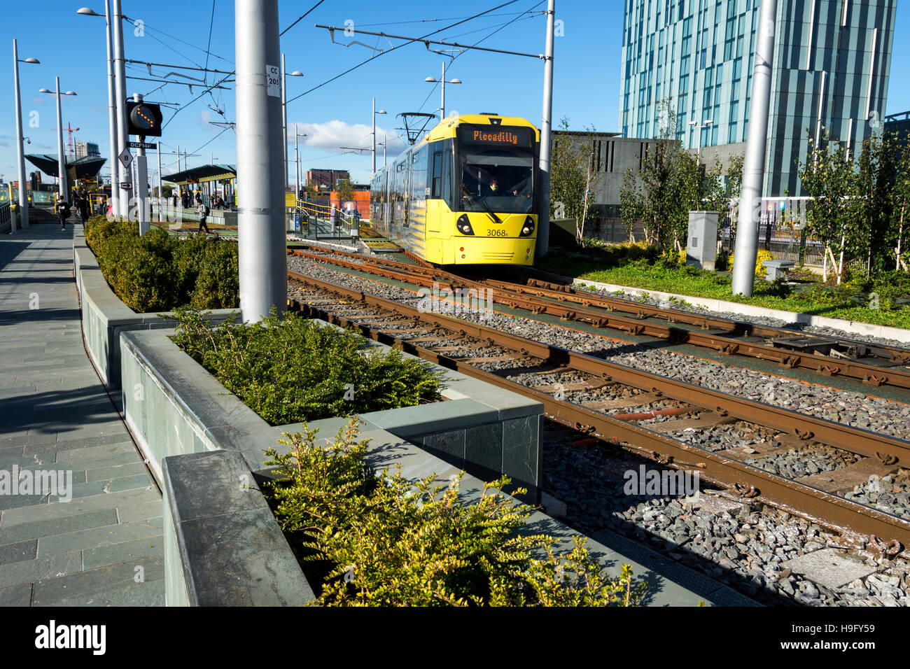 Tram, flower beds and landscaping at the DeansgateCastlefield tram