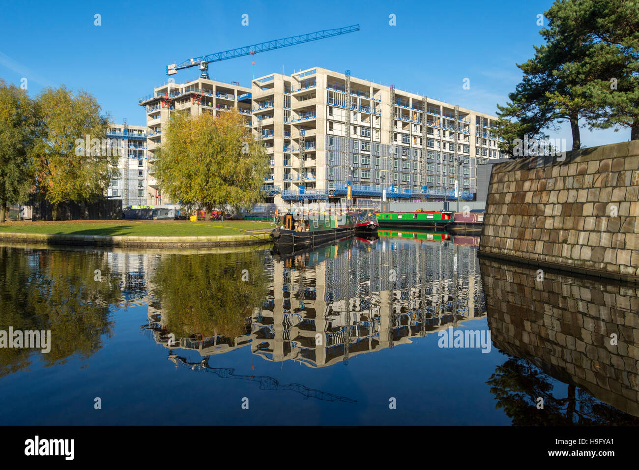 The 'Cotton Field Wharf' apartment blocks under construction from the Cotton Field Park marina