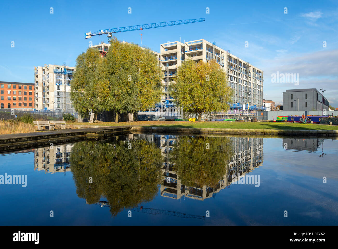 The 'Cotton Field Wharf' apartment blocks under construction from the Cotton Field Park marina