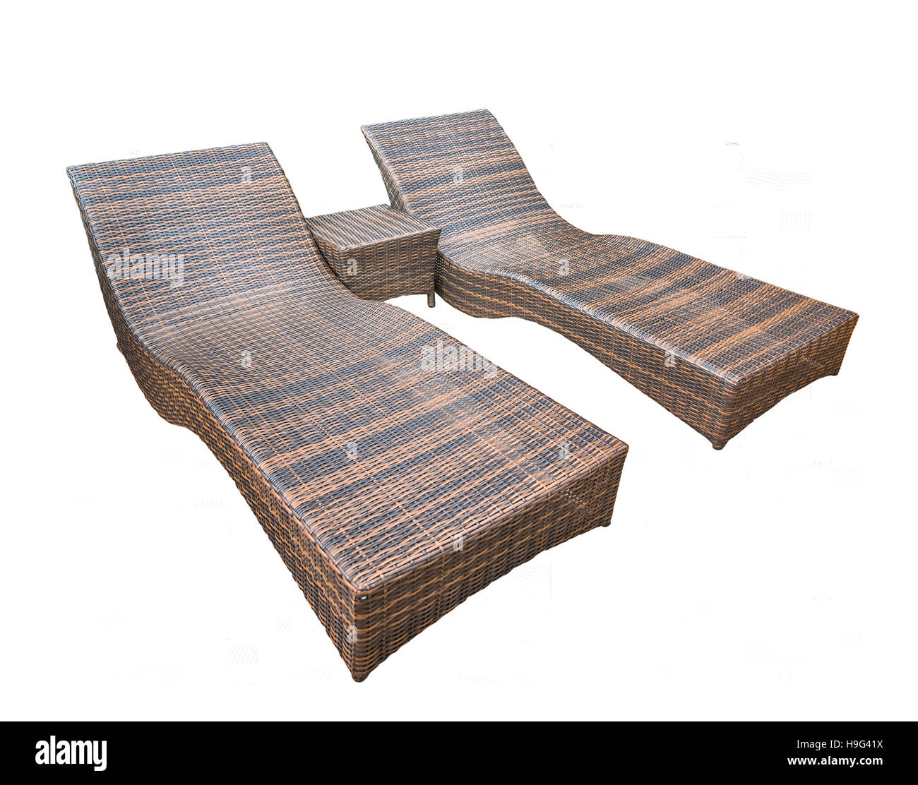 Rattan chaise lounge isolated on white background with clipping path. Stock Photo