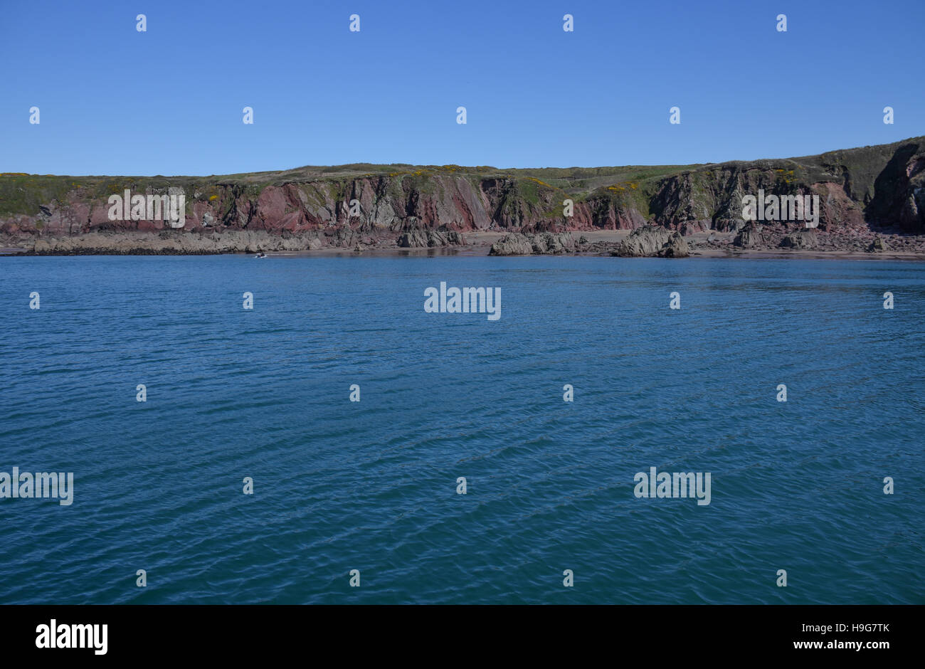 Killroom Bay is a beautifully secluded and sheltered beach in the Milford Haven Stock Photo