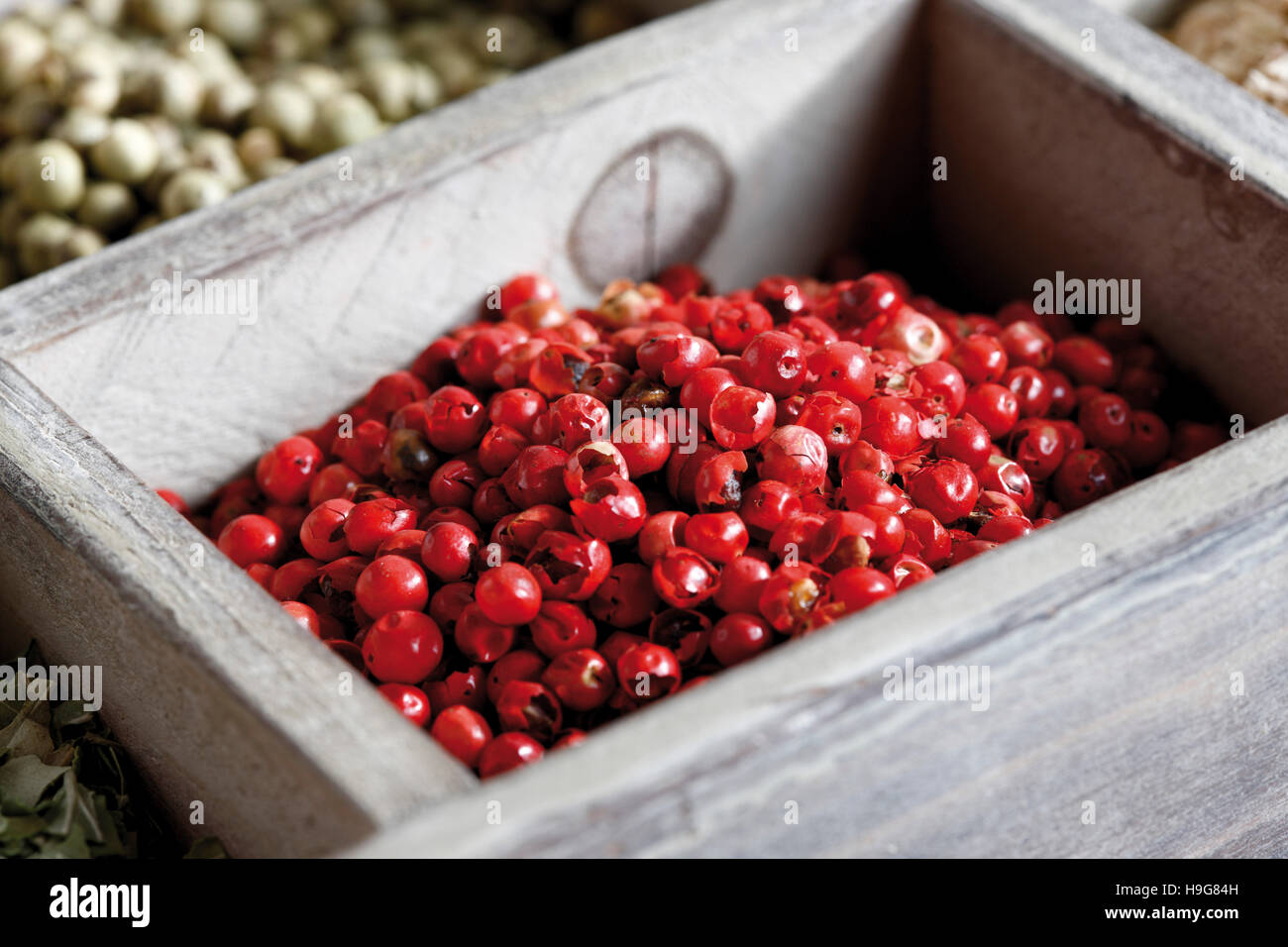 Spices in a case, pink pepper Stock Photo