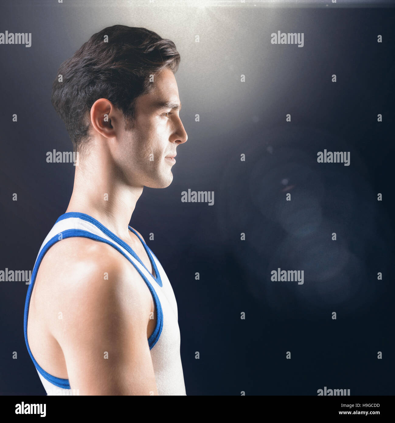 Composite image of side view of male athlete on black background Stock ...