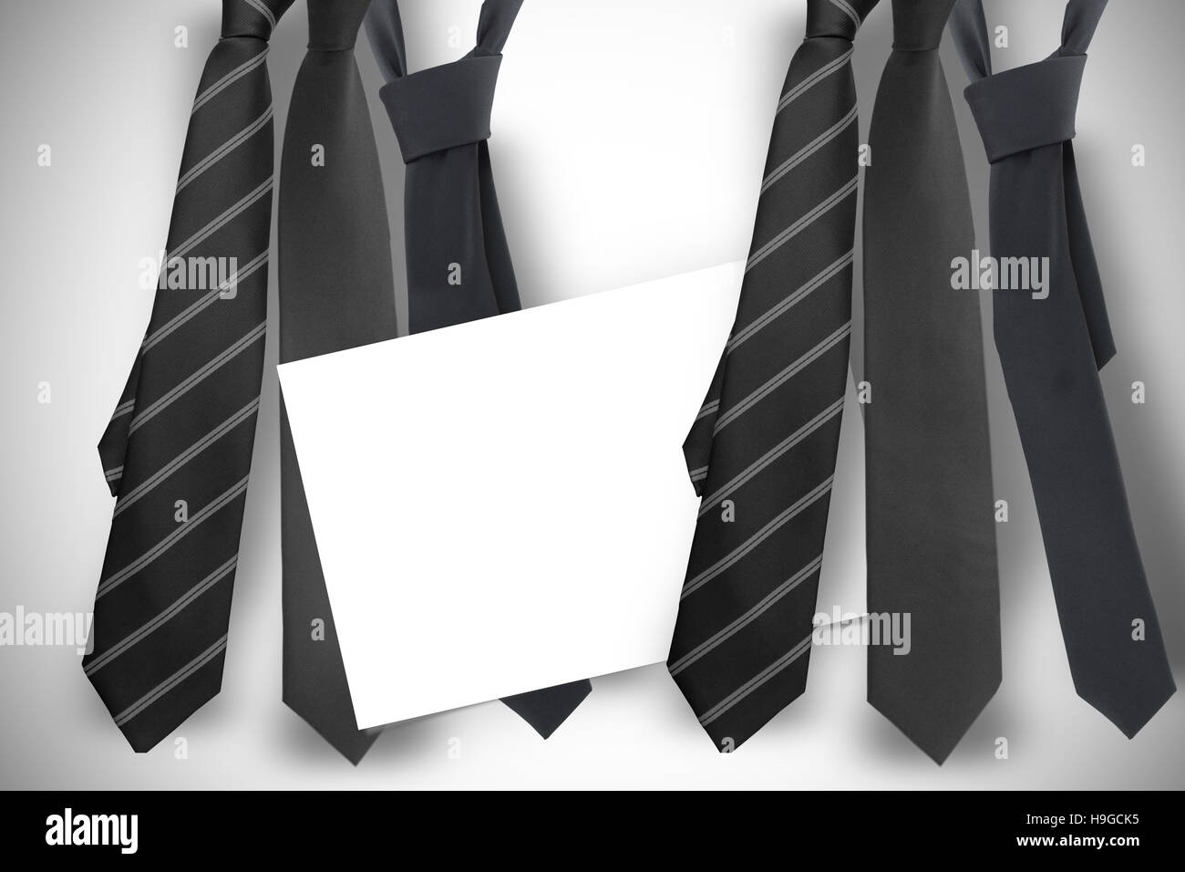 Composite image of blue tie with diagonal line Stock Photo