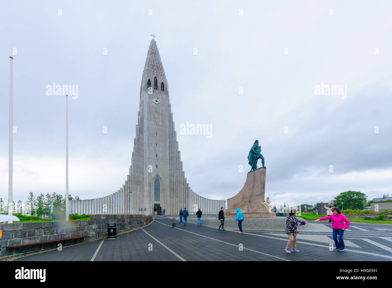 REYKJAVIK, ICELAND - JUNE 10, 2016: View of the Hallgrimskirkja church, with visitors, in Reykjavik, Iceland Stock Photo